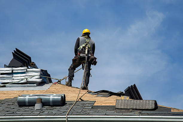 Professional Roofing technician working in Oakland Mills, PA